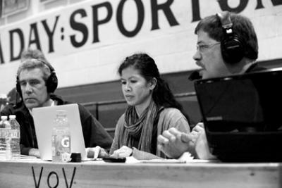 Kevin Linnell and John Yates announce a Pirates basketball game with JoJo Weller providing statistics.