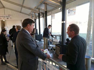 Congressman Benishek visiting with Roger Lehet at the Alliance For Green Heat event.